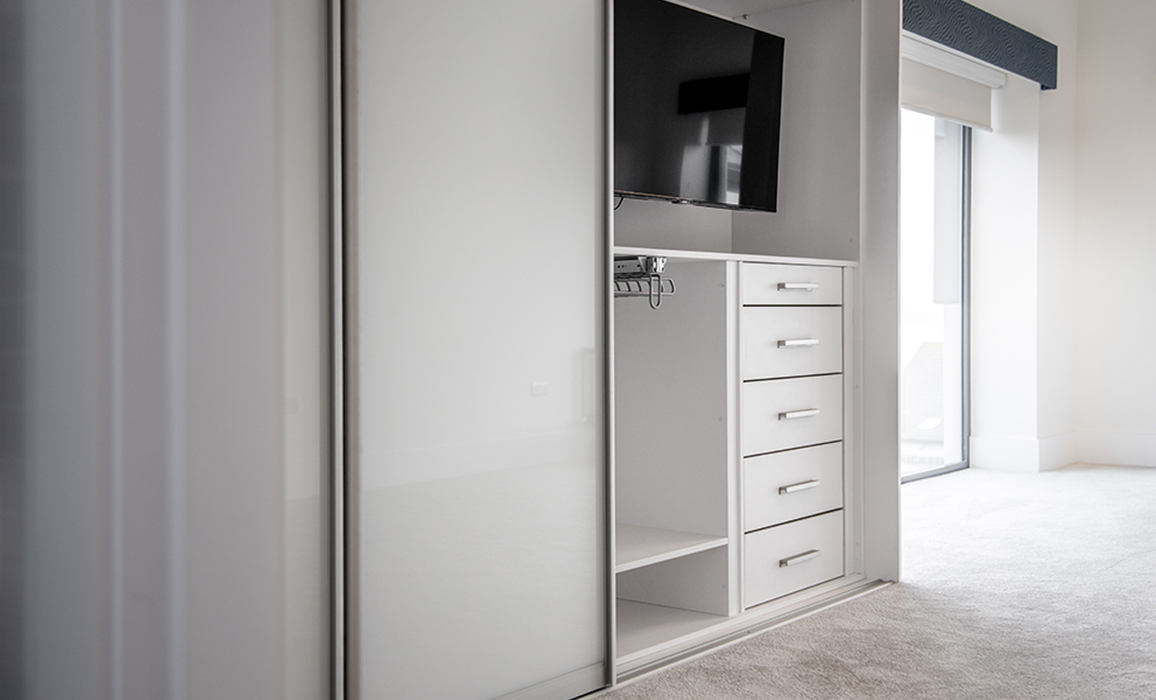 sliding bedroom wardrobe hidden tv