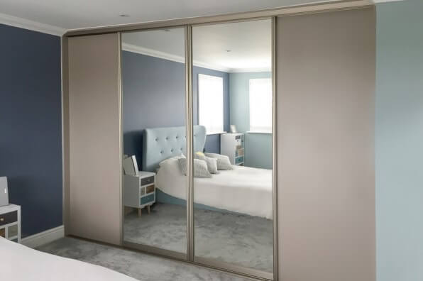 beige sliding wardrobe with mirrored doors
