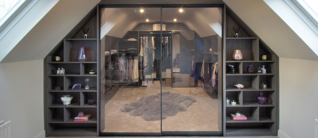close up of walk in wardrobe with clear class