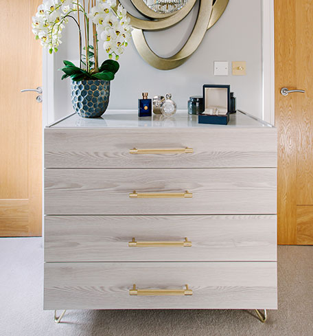 chest of drawers with gold handles