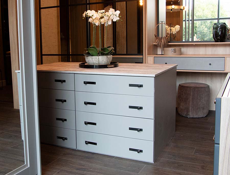 freestanding chest of drawers with black handles
