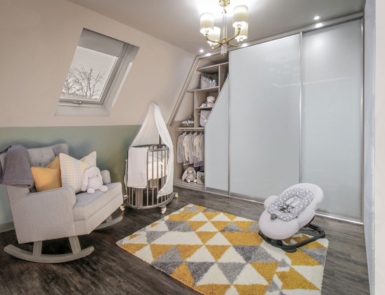 baby room with angled wardrobe
