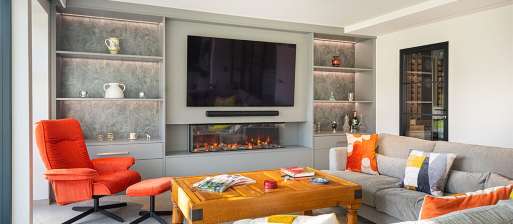 media unit with tv and fireplace