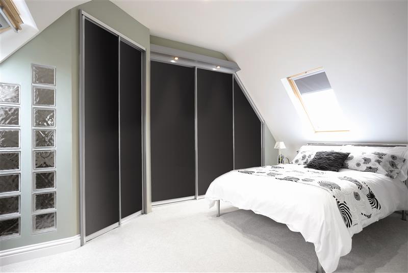 black sliding angled wardrobe