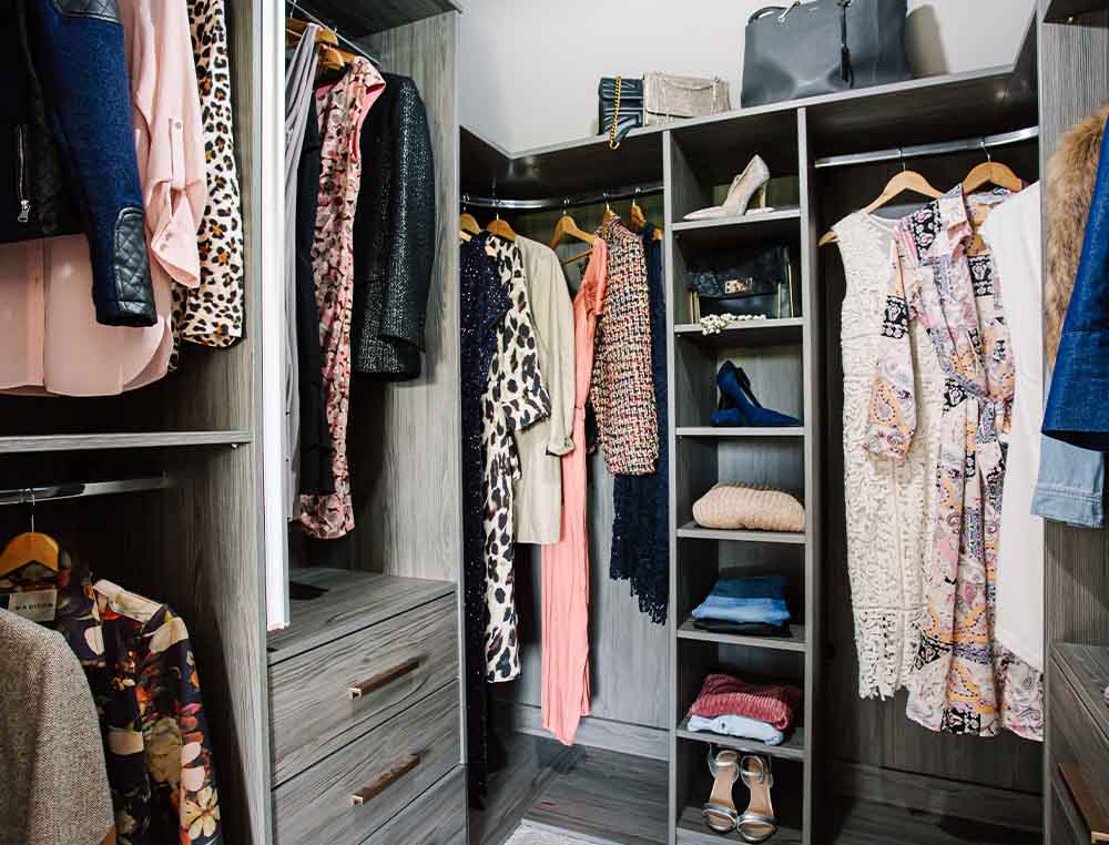 close up of clothes and shoes in shelving