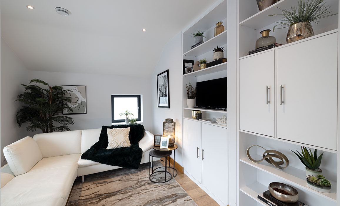 living area with doors and shelves